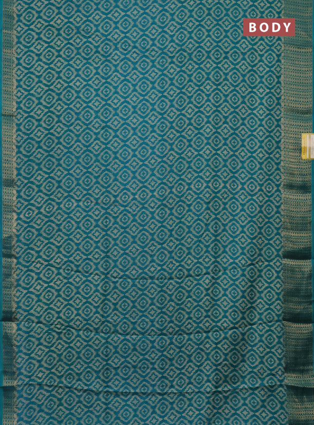 Semi dola saree teal blue with allover prints and zari woven border