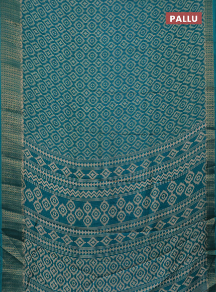 Semi dola saree teal blue with allover prints and zari woven border