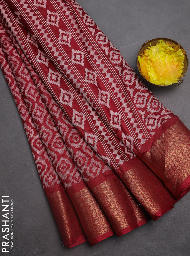 Semi dola saree maroon with allover prints and zari woven border
