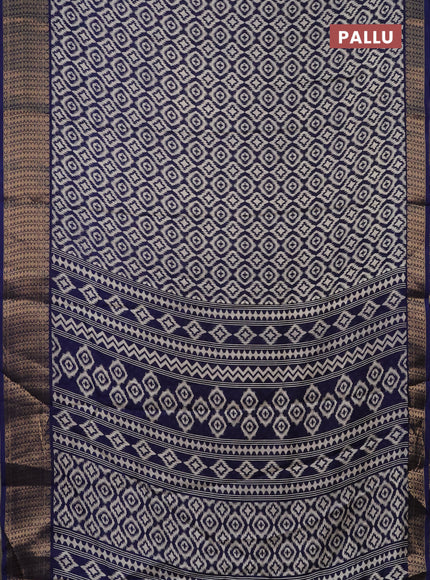 Semi dola saree dark blue with allover prints and zari woven border