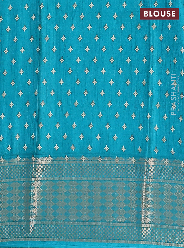 Semi dola saree teal green with allover prints and zari woven border