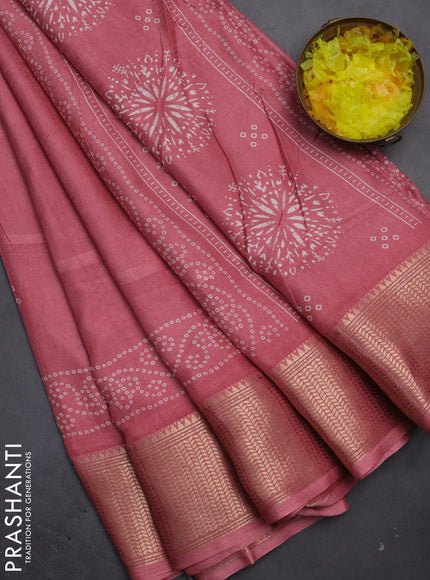 Semi dola saree peach pink with bandhani butta prints and zari woven border