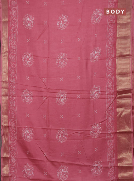 Semi dola saree peach pink with bandhani butta prints and zari woven border