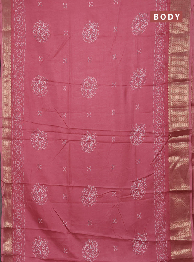 Semi dola saree peach pink with bandhani butta prints and zari woven border