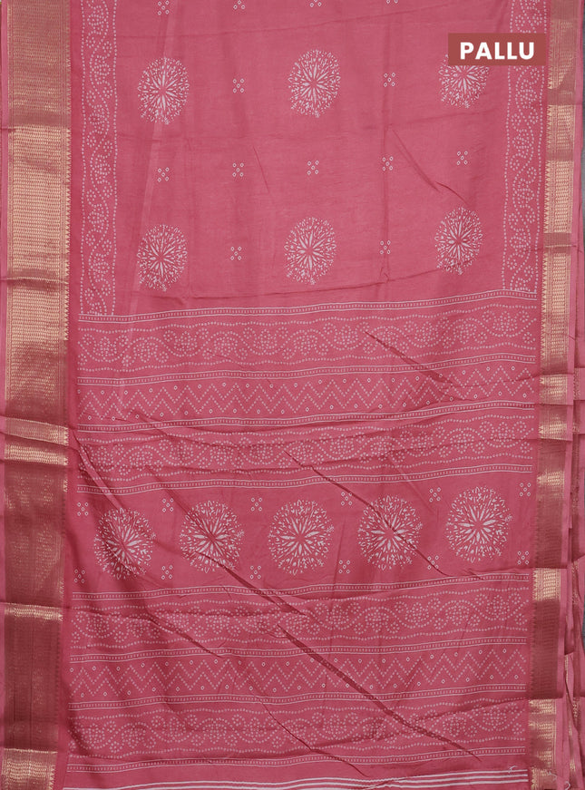 Semi dola saree peach pink with bandhani butta prints and zari woven border