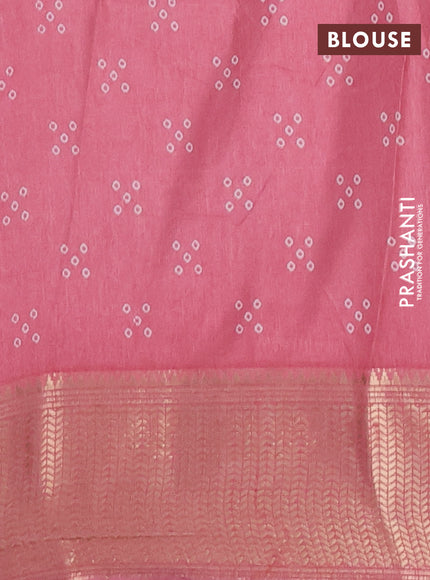 Semi dola saree peach pink with bandhani butta prints and zari woven border