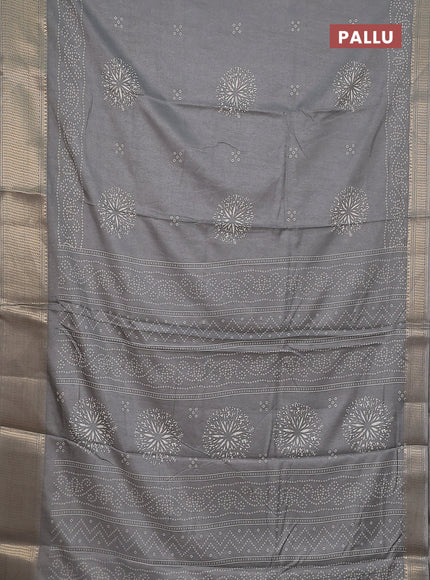 Semi dola saree grey with bandhani butta prints and zari woven border