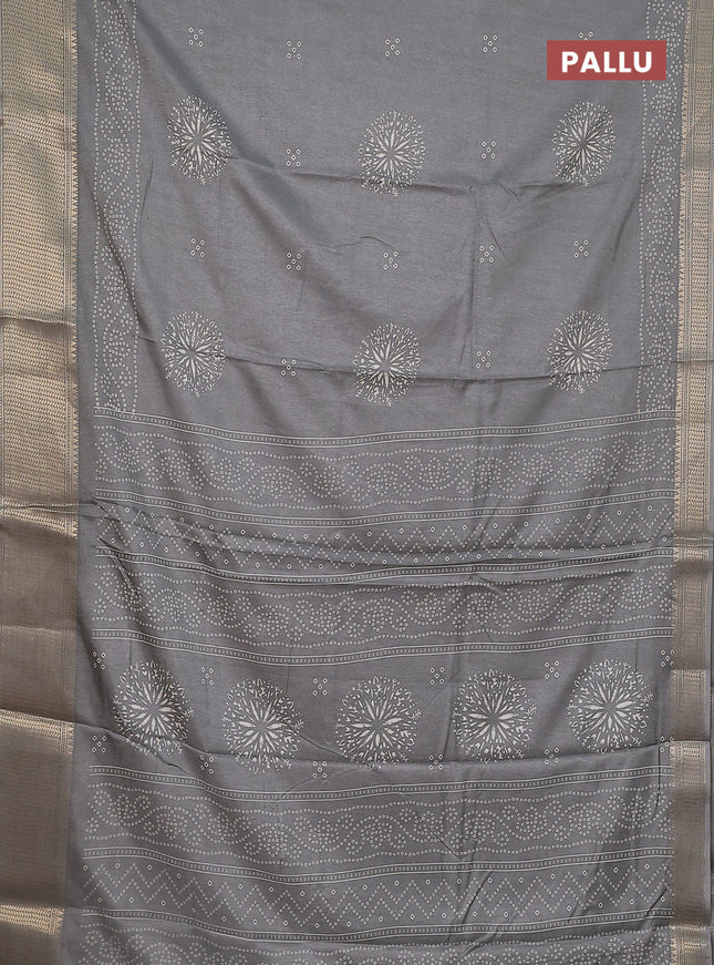 Semi dola saree grey with bandhani butta prints and zari woven border