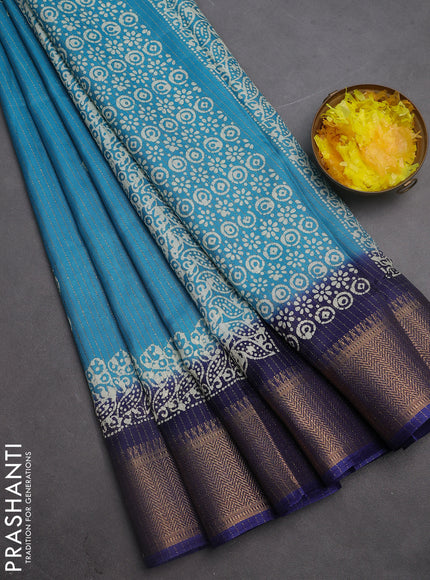 Semi dola saree teal blue and blue with zari stripes pattern & butta prints and zari woven border
