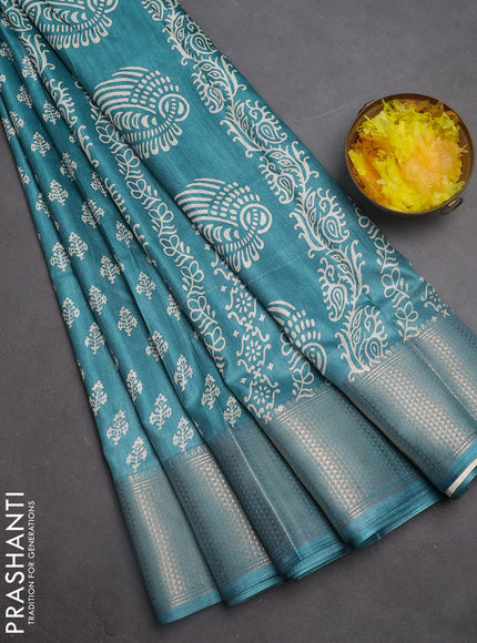 Semi dola saree teal green shade with butta prints and zari woven border