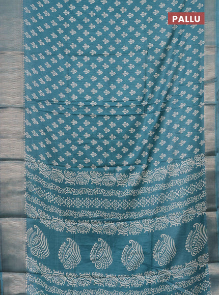 Semi dola saree teal green shade with butta prints and zari woven border