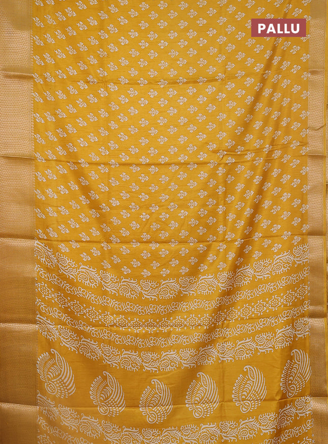 Semi dola saree mustard yellow with butta prints and zari woven border