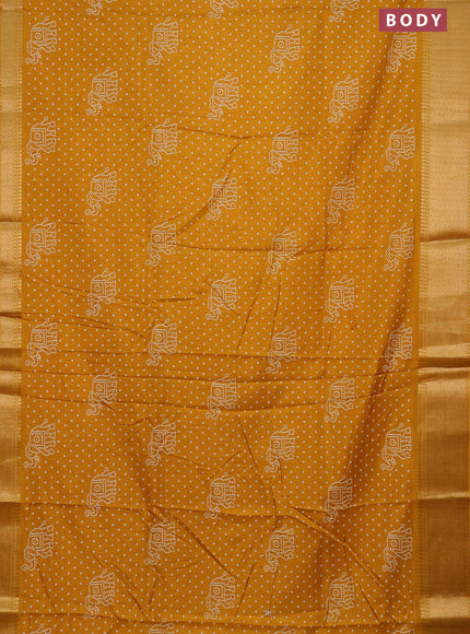 Semi dola saree mustard yellow with bandhani butta prints and zari woven border
