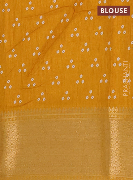 Semi dola saree mustard yellow with bandhani butta prints and zari woven border