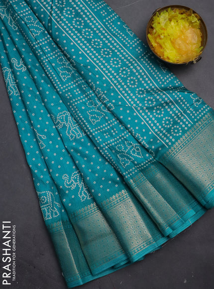 Semi dola saree teal blue with bandhani butta prints and zari woven border