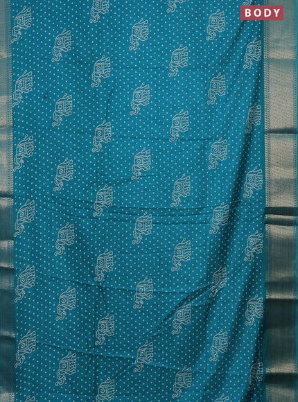 Semi dola saree teal blue with bandhani butta prints and zari woven border