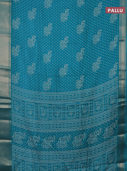 Semi dola saree teal blue with bandhani butta prints and zari woven border