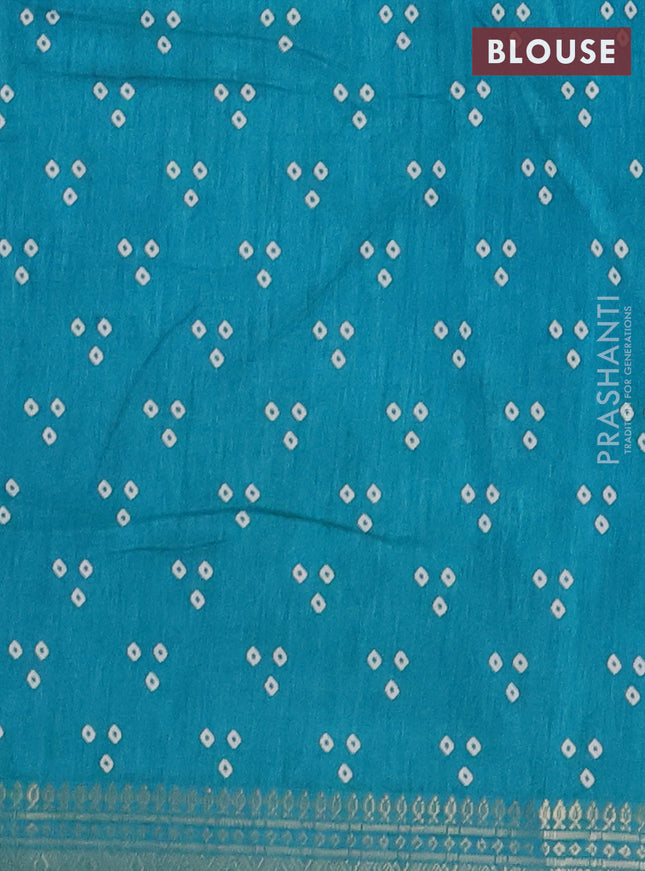 Semi dola saree teal blue with bandhani butta prints and zari woven border
