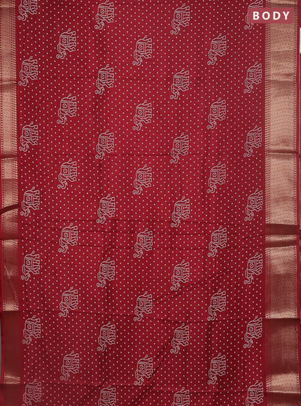 Semi dola saree maroon with bandhani butta prints and zari woven border