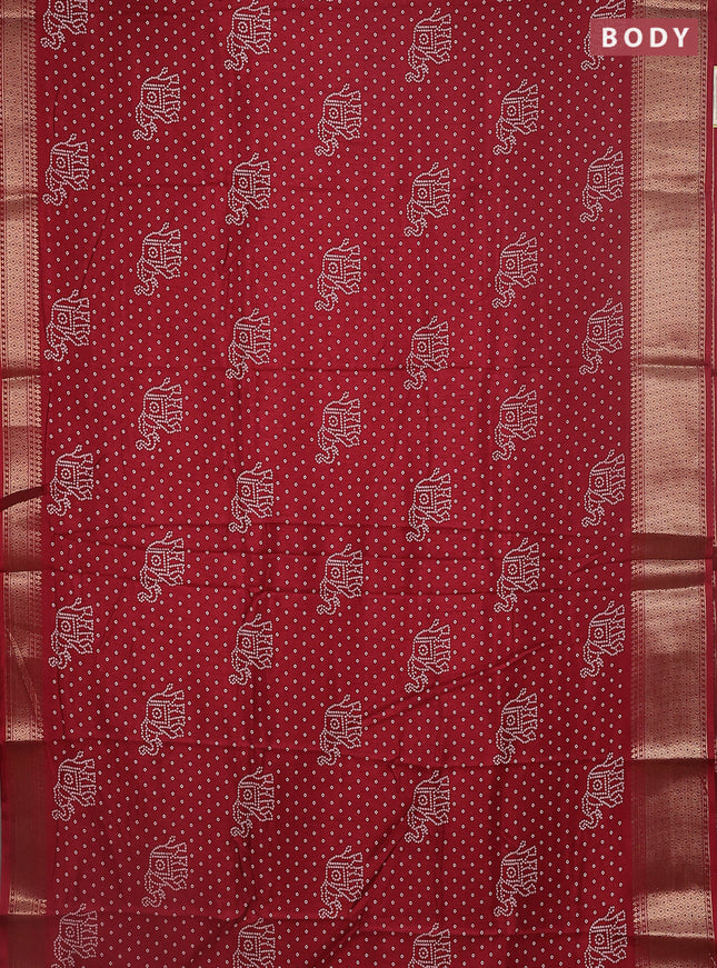 Semi dola saree maroon with bandhani butta prints and zari woven border