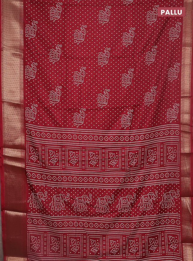 Semi dola saree maroon with bandhani butta prints and zari woven border
