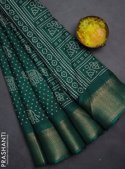 Semi dola saree green with bandhani butta prints and zari woven border