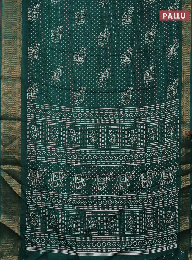 Semi dola saree green with bandhani butta prints and zari woven border