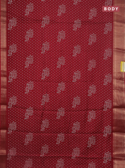 Semi dola saree maroon with bandhani butta prints and zari woven border