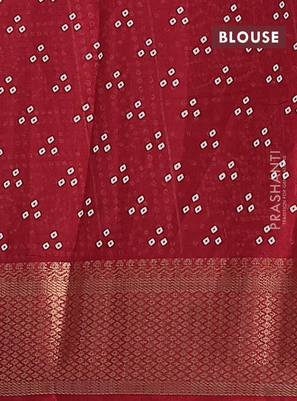 Semi dola saree maroon with bandhani butta prints and zari woven border