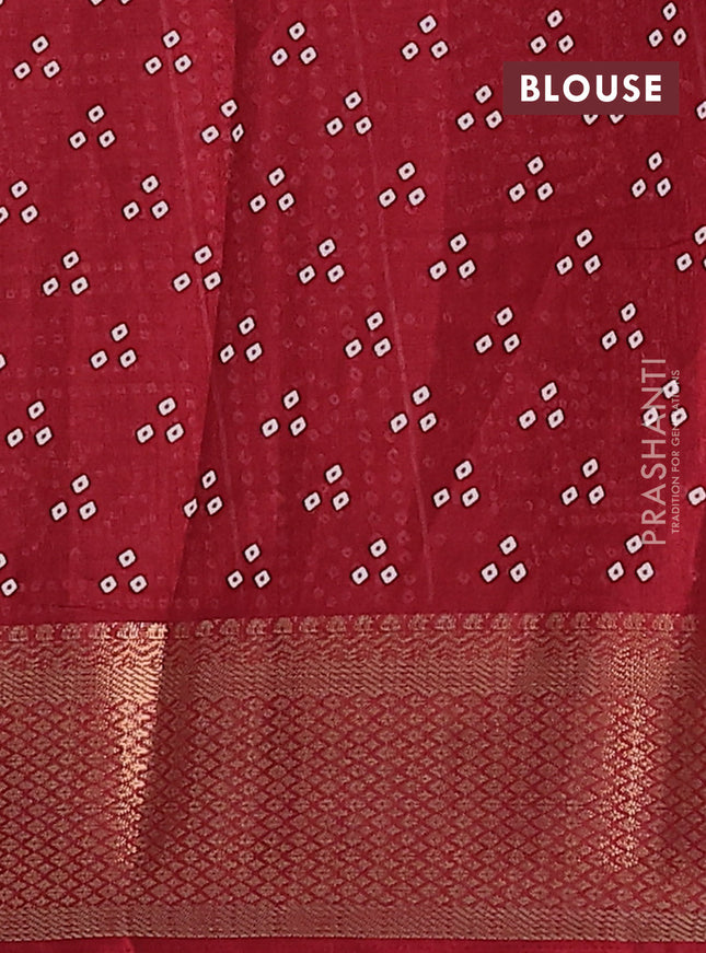 Semi dola saree maroon with bandhani butta prints and zari woven border