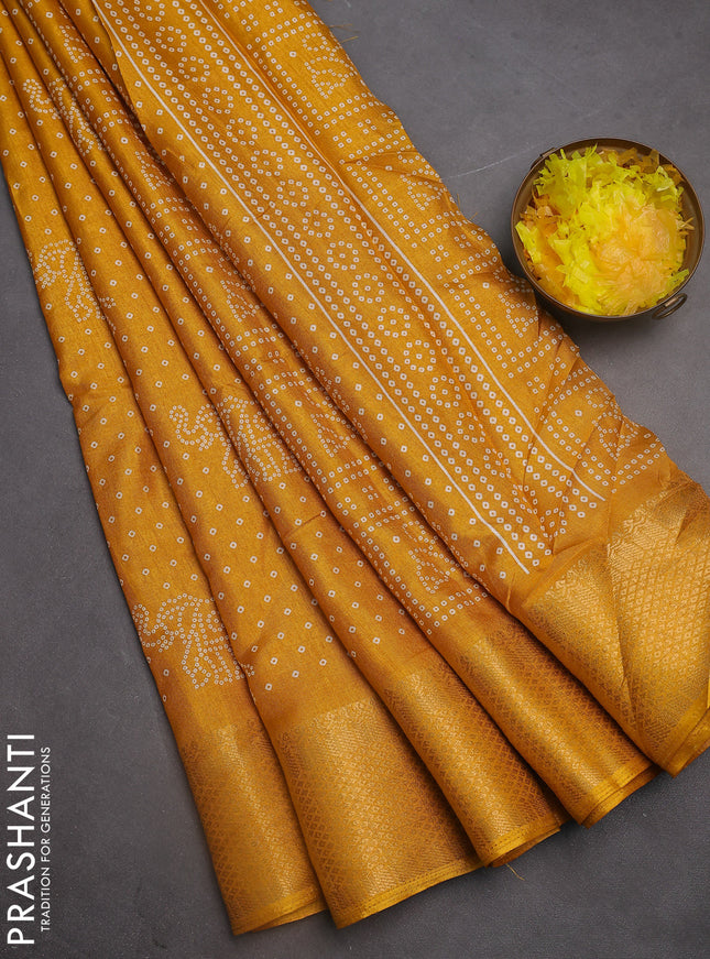 Semi dola saree mustard yellow with bandhani butta prints and zari woven border