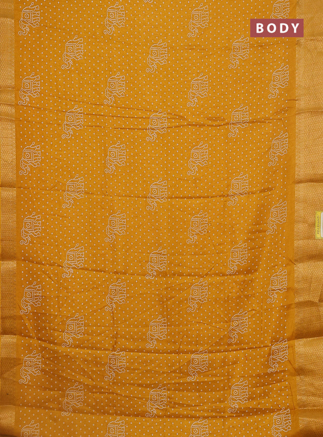 Semi dola saree mustard yellow with bandhani butta prints and zari woven border