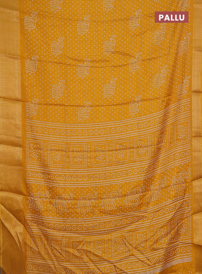 Semi dola saree mustard yellow with bandhani butta prints and zari woven border