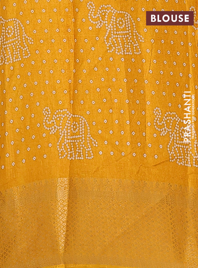 Semi dola saree mustard yellow with bandhani butta prints and zari woven border