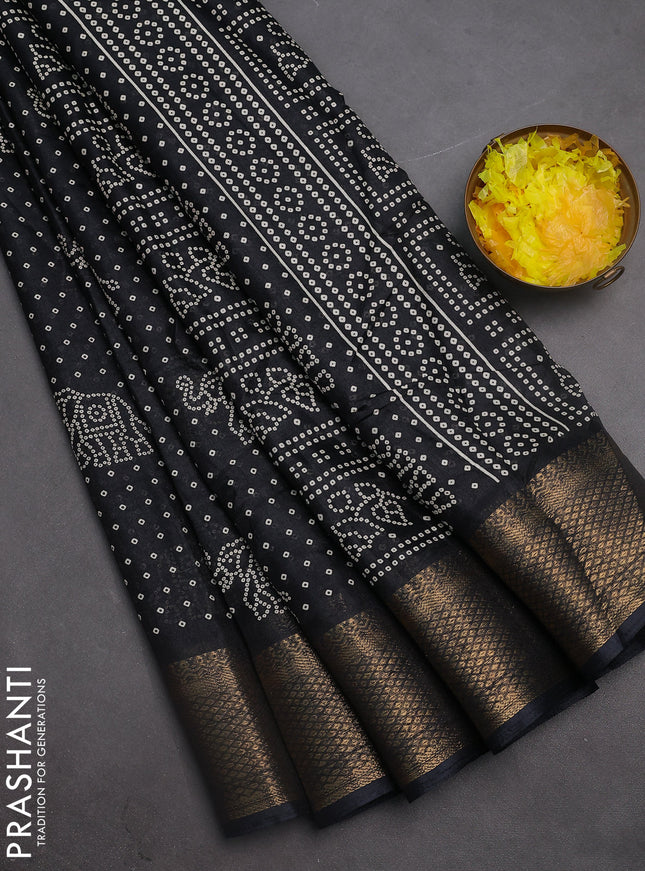 Semi dola saree black with bandhani butta prints and zari woven border