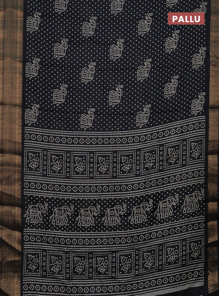 Semi dola saree black with bandhani butta prints and zari woven border