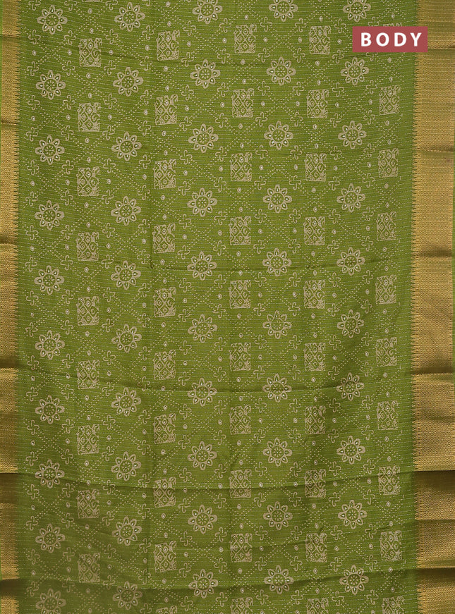 Semi dola saree light green with allover zari stripes & prints and zari woven border