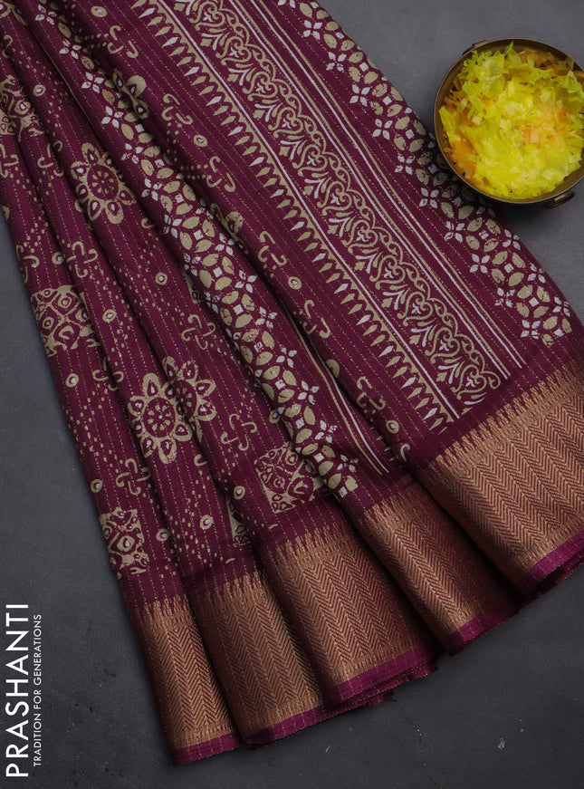 Semi dola saree wine shade with allover zari stripes & prints and zari woven border