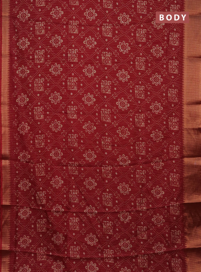 Semi dola saree maroon with allover zari stripes & prints and zari woven border