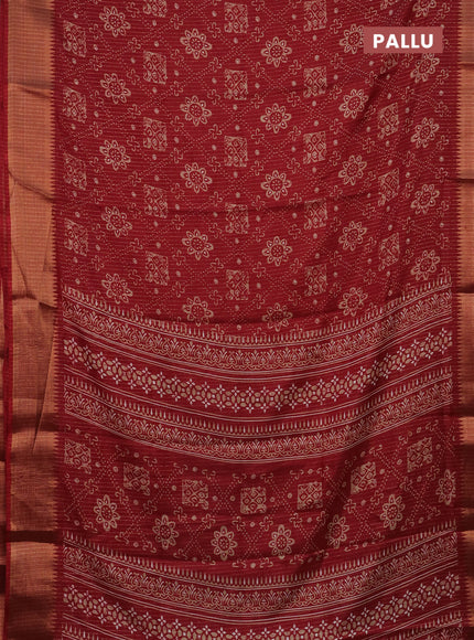 Semi dola saree maroon with allover zari stripes & prints and zari woven border