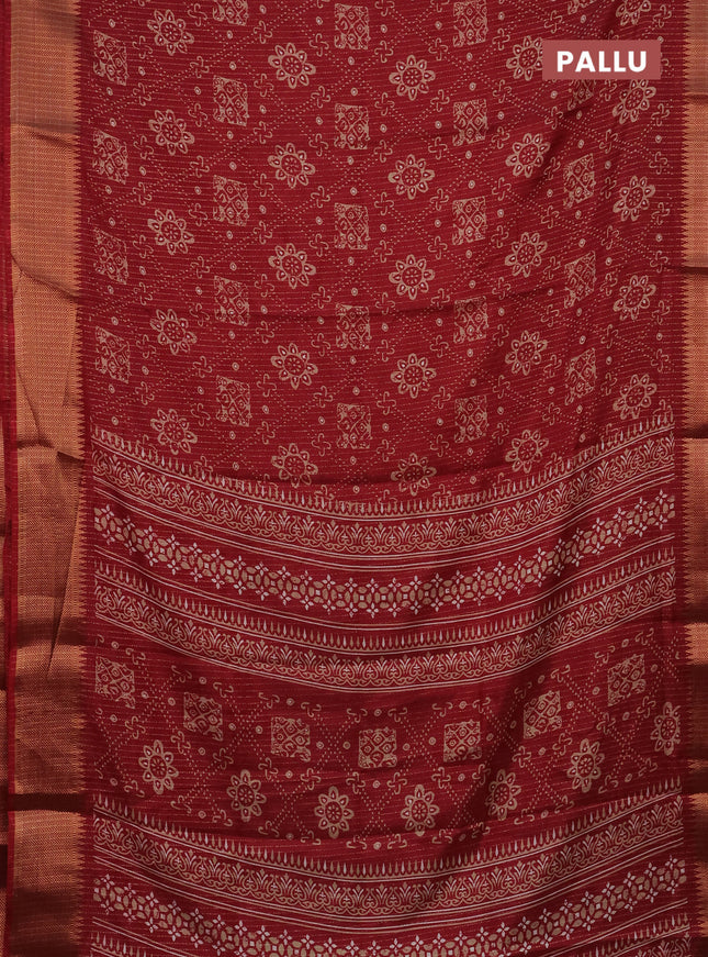 Semi dola saree maroon with allover zari stripes & prints and zari woven border