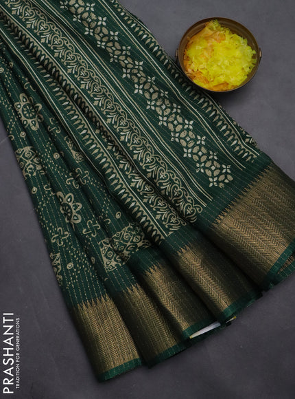 Semi dola saree green with allover zari stripes & prints and zari woven border