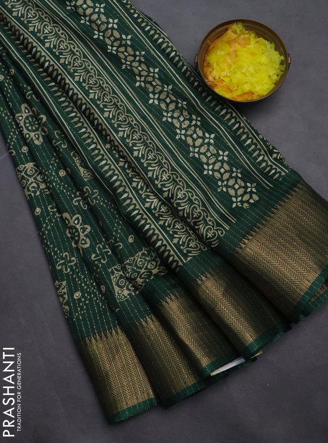 Semi dola saree green with allover zari stripes & prints and zari woven border