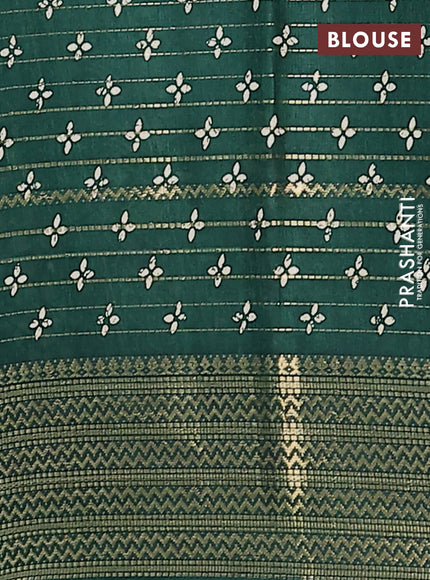 Semi dola saree green with allover zari stripes & prints and zari woven border