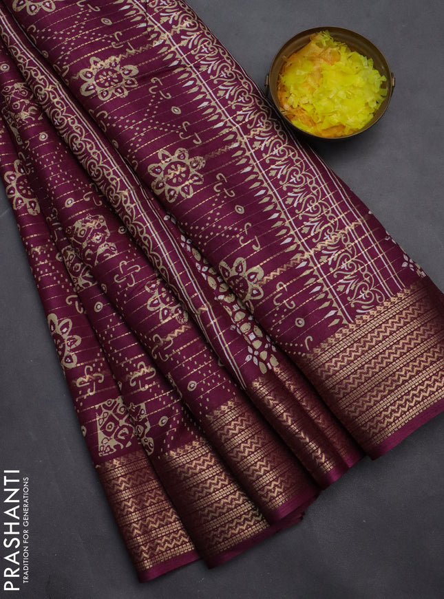 Semi dola saree wine shade with allover zari stripes & prints and zari woven border