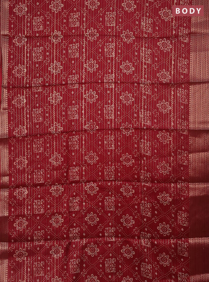 Semi dola saree maroon with allover zari stripes & prints and zari woven border