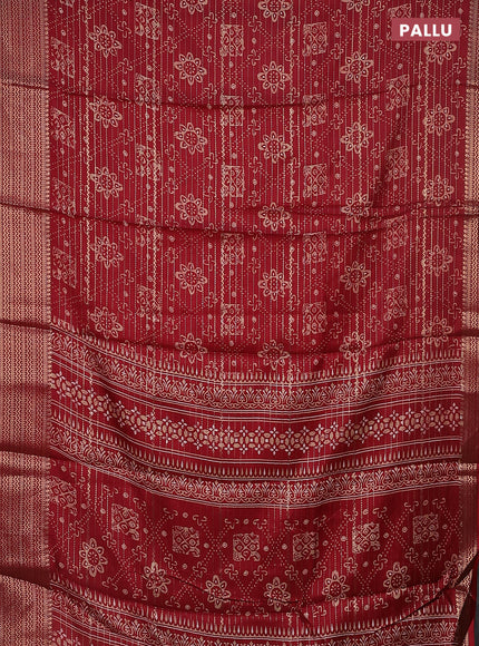 Semi dola saree maroon with allover zari stripes & prints and zari woven border