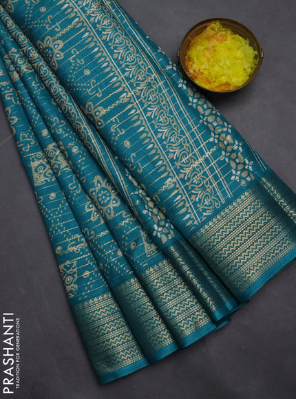 Semi dola saree teal blue with allover zari stripes & prints and zari woven border