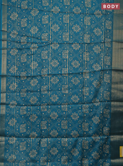 Semi dola saree teal blue with allover zari stripes & prints and zari woven border