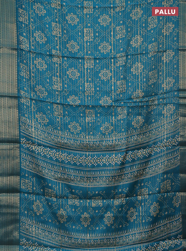 Semi dola saree teal blue with allover zari stripes & prints and zari woven border